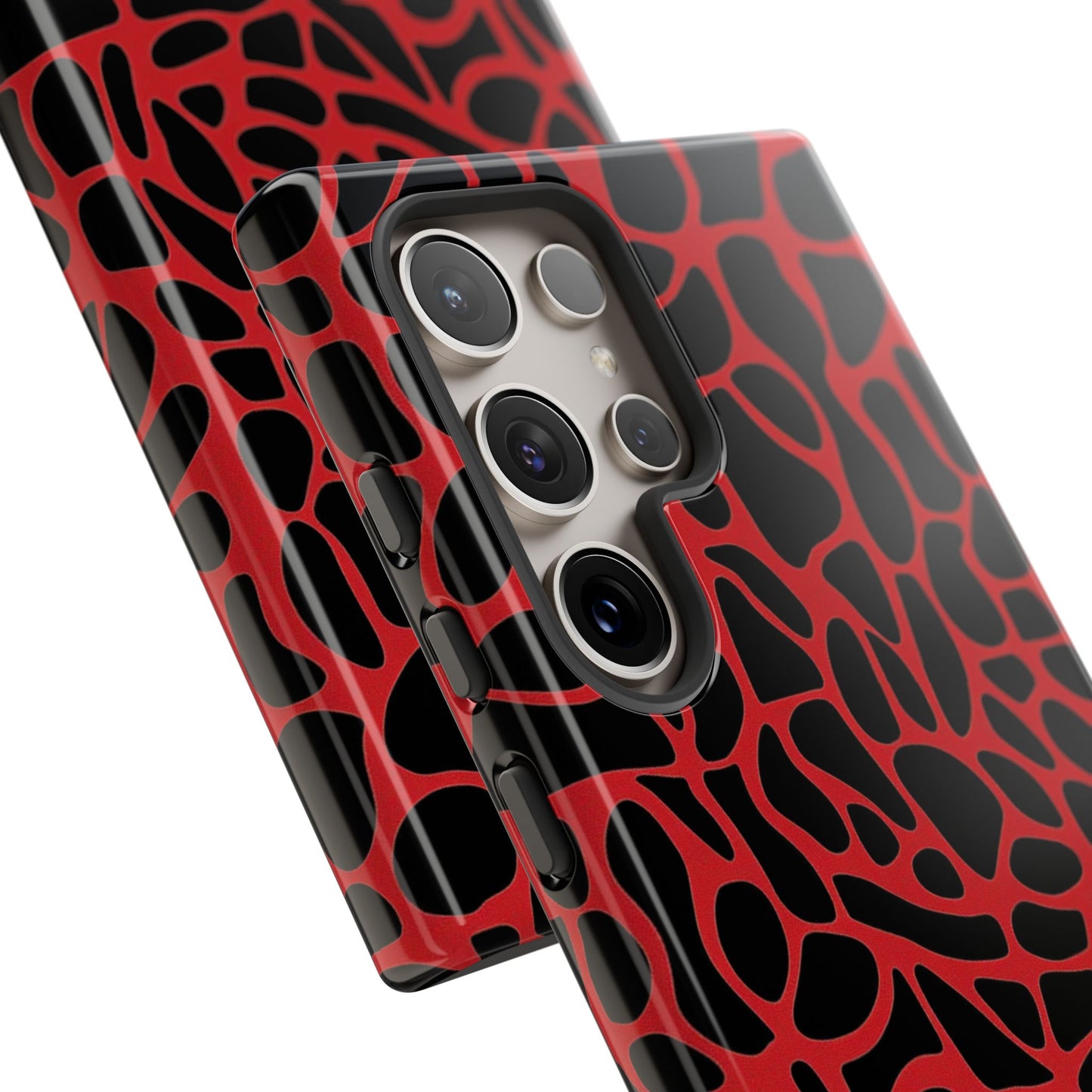 Statement animal print phone case with vibrant red spots
