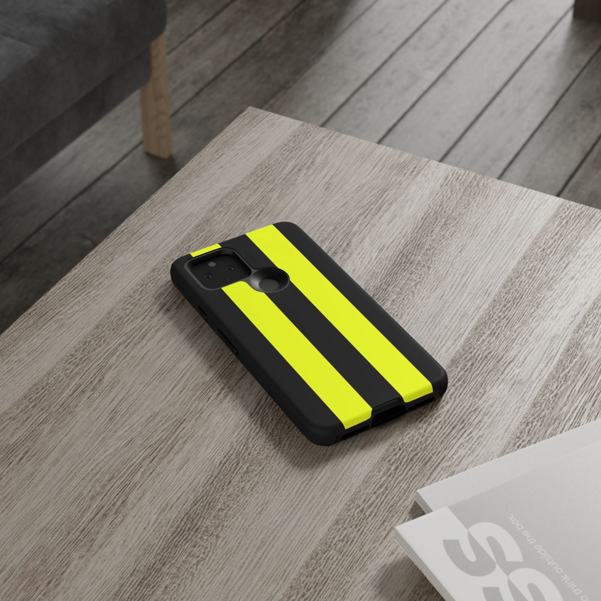 Performance racing stripes phone case in neon yellow and matte black with impact-resistant protection
