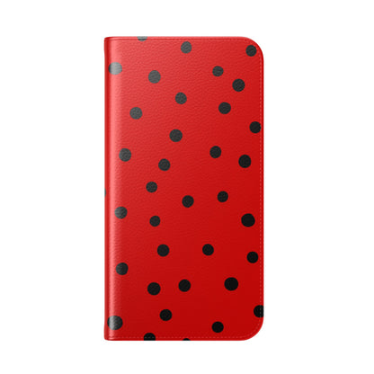 Vintage-inspired red phone wallet with black polka dot design, D-ring attachment and magnetic closure
