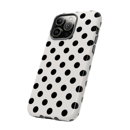 Black polka dot tough phone case on white background showing slim profile and wireless charging compatibility
