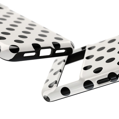 Black and white polka dot phone case back view displaying full pattern coverage and camera cutout
