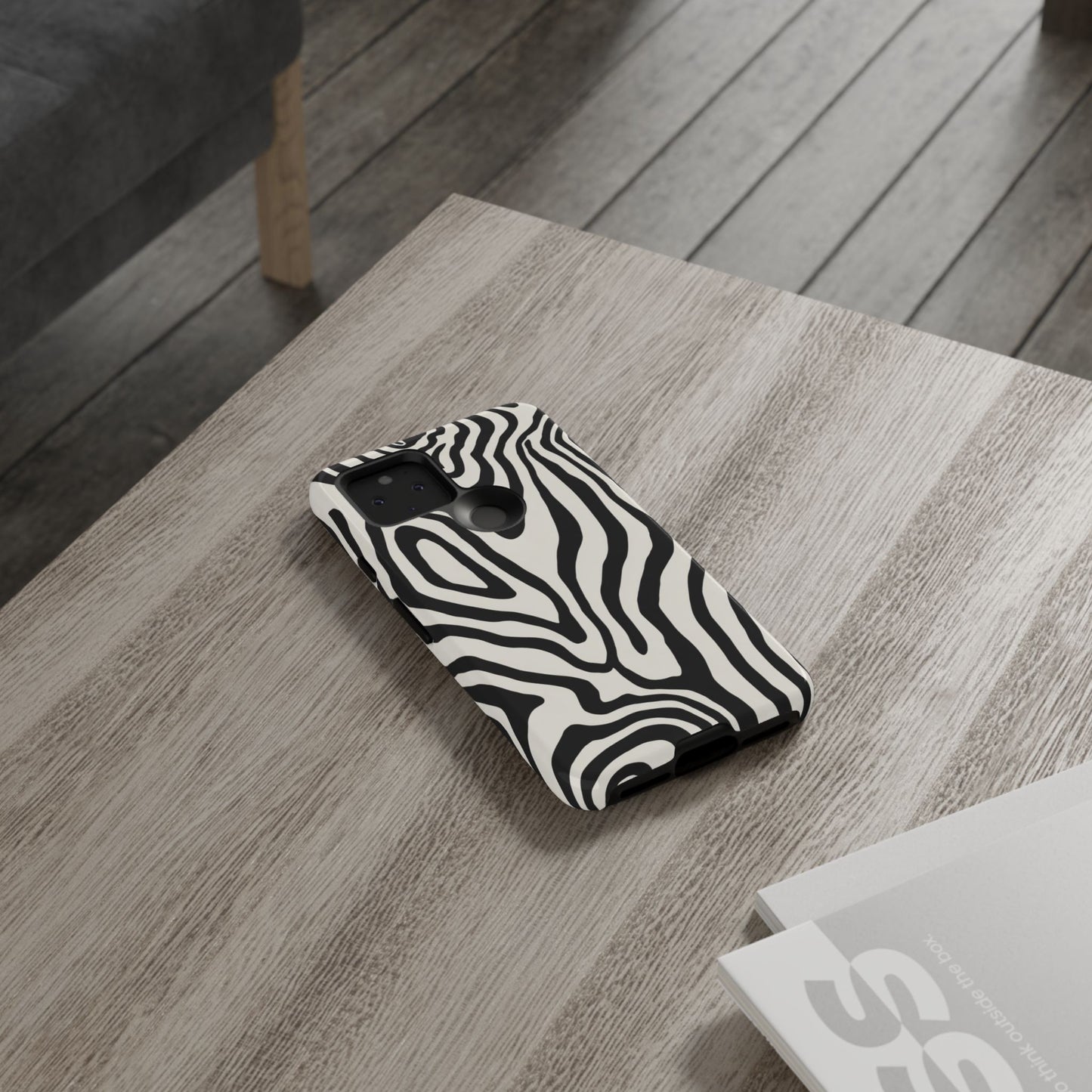 Monochrome zebra swirl phone case - bold black and white design with dual-layer protection and slim fit
