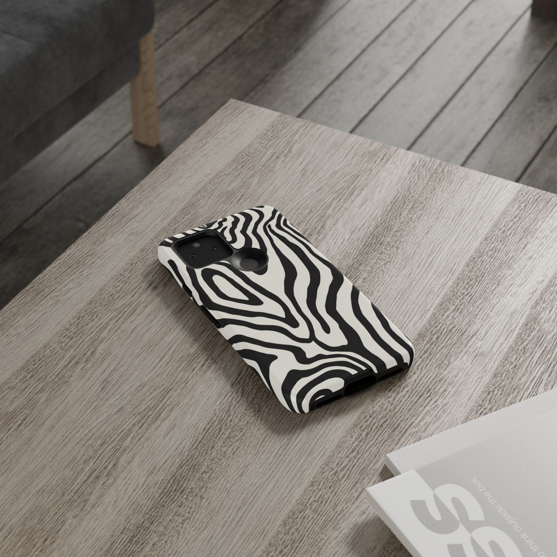 Monochrome zebra swirl phone case - bold black and white design with dual-layer protection and slim fit
