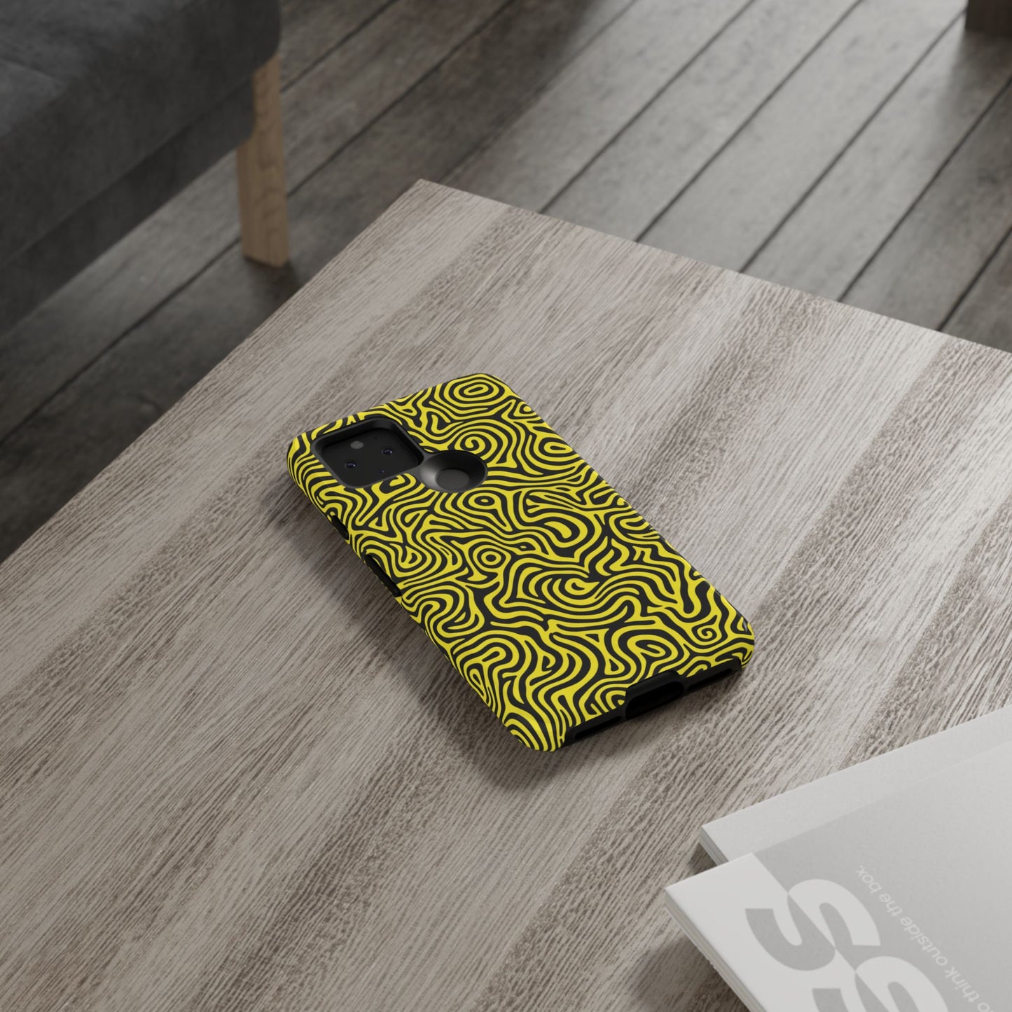 Bold abstract design protective case in yellow black showing hypnotic pattern for all phone models
