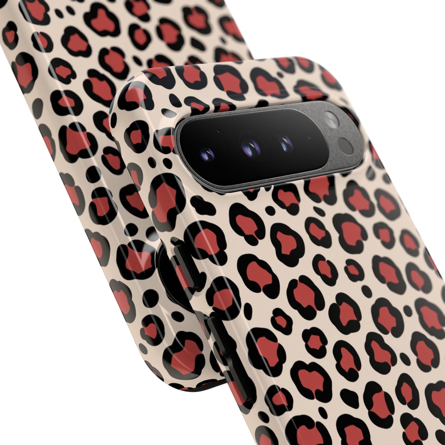 Animal print protective phone case with pink cream background and black spots pattern
