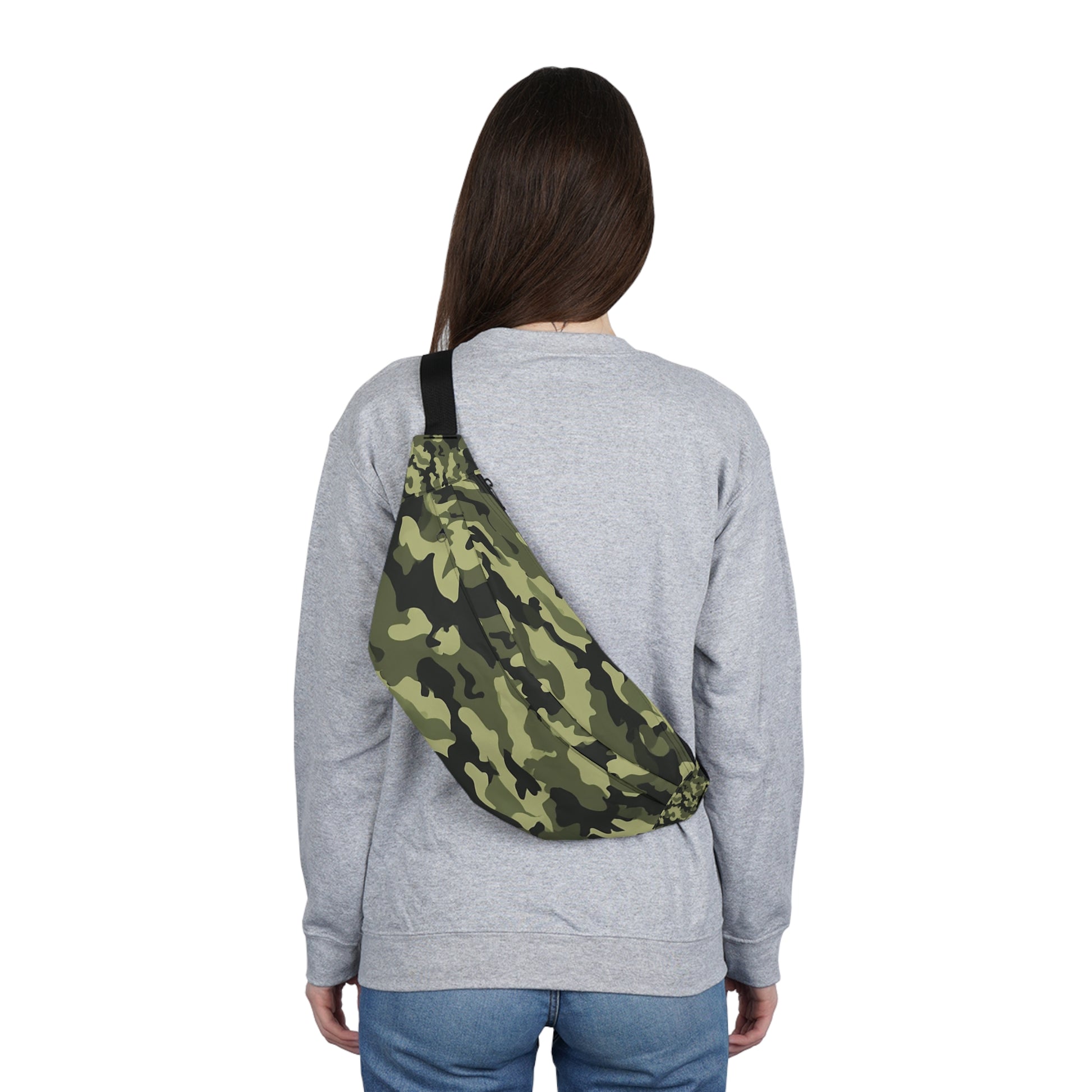 Woman with military camo fanny pack at outdoor event – large green waist bag with zip pockets
